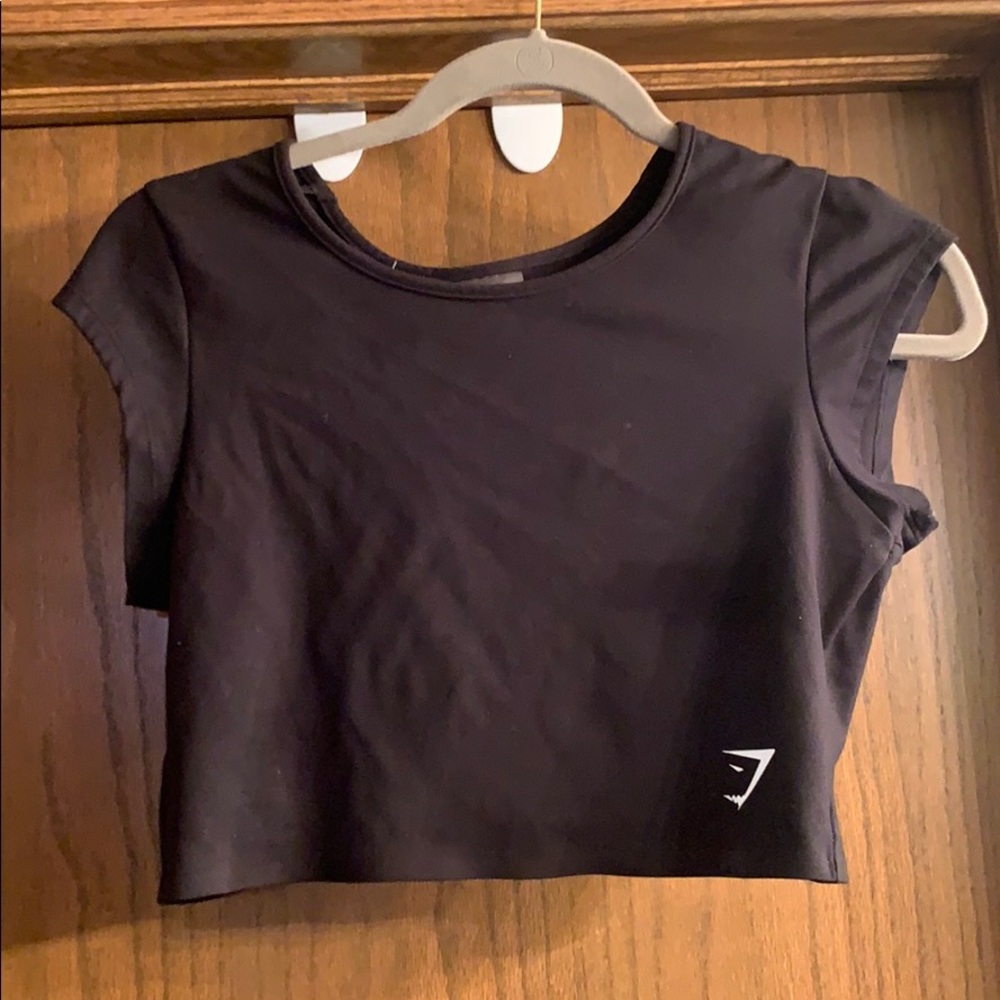 Gymshark black short sleeve crop top. Size M